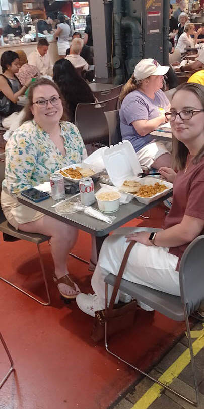two women sitting at a table