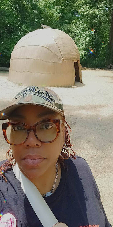 Ta-Tanisha Pierre with a wigwam.