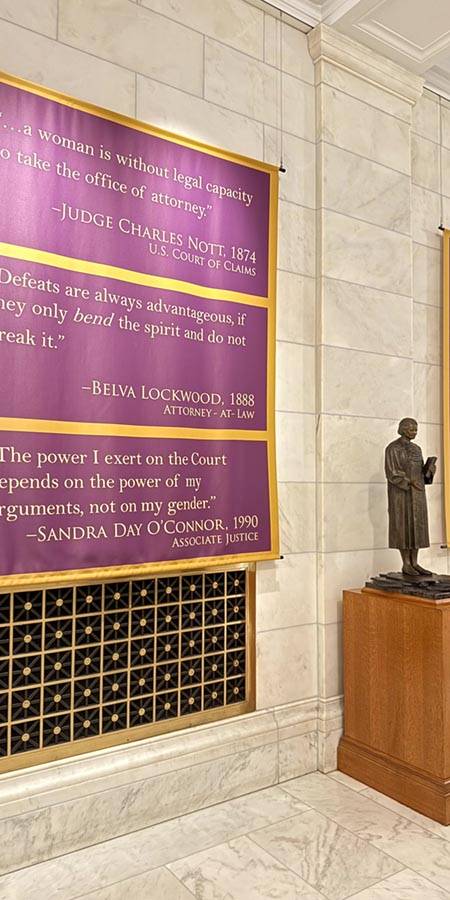 magenta banners and statue of Sandra Day O'Connor