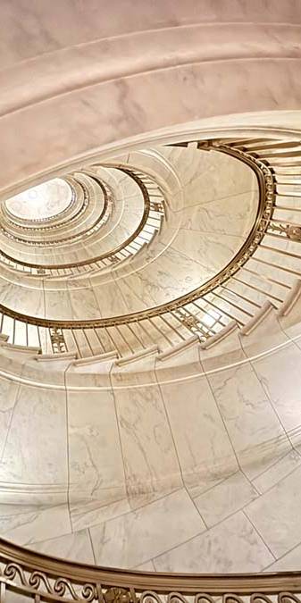 Spiral staircase seen from below.